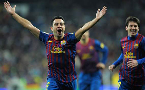 Xavi ăn mừng sau bàn thắng nâng tỷ số lên 2-1