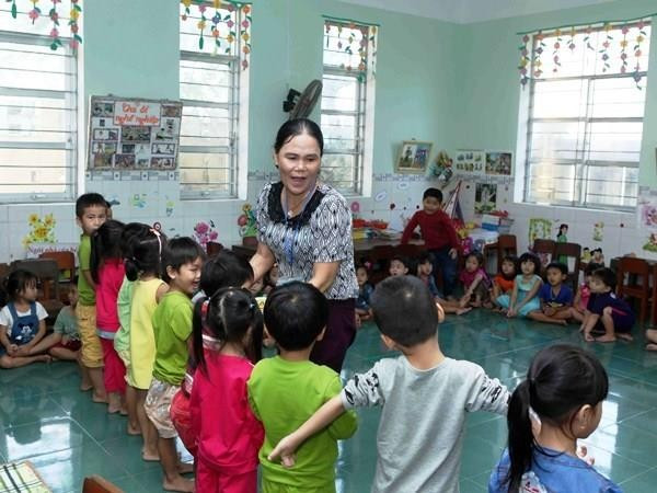 Giáo viên mong được ưu tiên nghỉ hưu sớm, nếu không giảm được thì xin đừng tăng.(Ảnh minh họa: TTXVN).