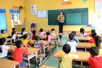 Học sinh lớp 1 nếu không biết đọc, biết viết phải được ở lại lớp (Ảnh minh họa: Báo Tuyên Quang)