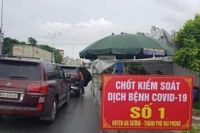 Phòng tránh Covid-19, người dân về quê đón Tết có phải cách ly không?