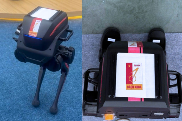 Khu trưng bày tại triển lãm, Robot hai chân bị che hoàn toàn logo và nhãn mác của nhà sản xuất nước ngoài, thay vào đó là logo của Đại học Bách khoa Hà Nội. Ảnh: NVCC nha-van.png