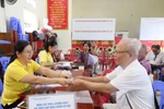 BHXH Lào Cai đảm bảo tiến độ chi trả lương hưu, trợ cấp BHXH theo mức mới