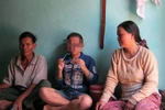 Kinh hoàng lấy liềm mổ bụng vợ cứu con