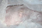 Phát hiện gần 14 tấn thịt thối bao bì Trung Quốc
