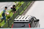 Ảnh: Những pha vượt rào chắn 'giỡn mặt tử thần' ở Hà Nội
