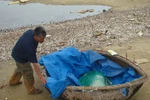 Phát hiện xác chết không đầu, không tay chân trôi trên biển