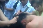 Nữ sinh đánh nhau rồi dùng điện thoại quay clip