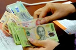 Sẽ tăng lương tối thiểu theo vùng từ 1/1/2013