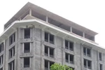 Tòa nhà 28A Trần Hưng Đạo cao 10 tầng xây dựng sai phép, ai đứng sau chống lưng?