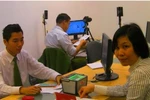 Bỏ quy định ghi tên cha mẹ trên CMND