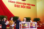 Các đại biểu bỏ phiếu bầu Ban Chấp hành Trung ương khóa XIII