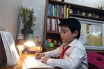 Cậu bé “vàng” có niềm đam mê vô tận với sách