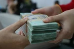 Vay tiền ngân hàng và “lại quả” cán bộ tín dụng