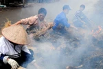 Về nơi cả làng ăn Tết Nguyên tiêu bằng thịt... chó