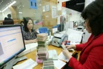 Bộ Tài chính đề nghị chia cổ tức bằng tiền mặt, các ngân hàng nói "không"