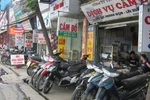 Mua xe máy ở hiệu cầm đồ, làm giấy tờ thế nào?