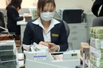 Nhiều ngân hàng "đánh phí" nộp tiền mặt từ lâu