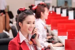 Giao dịch viên ngân hàng: Vất vả, lương thấp nhưng tự hào