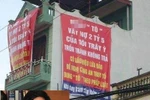 "Treo panô 'khủng' để đòi nợ trên nhà người khác là hành vi phạm pháp"