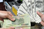Mua bán ngoại tệ có giá trị dưới 1.000 đôla Mỹ sẽ bị phạt cảnh cáo