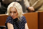 Lindsay Lohan tối vào tù sáng sớm được thả