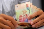Mức lương tối thiểu tăng thêm 220.000 đồng từ ngày 1/5/2012