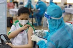 Đẩy nhanh tốc độ tiêm chủng cho trẻ để "Vui Trung thu và tựu trường an toàn"