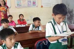 Tặng Bằng khen cho học sinh lớp 3 trả lại 44 triệu đồng nhặt được