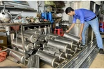 Hai giảng viên nghiên cứu thiết bị xử lý dầu giúp ngư dân tiết kiệm chi phí 
