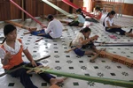 Chùm ảnh: Tạo việc làm cho người khuyết tật hòa nhập cộng đồng