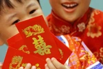 Có nên cho trẻ giữ tiền mừng tuổi?