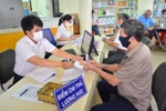 Khoảng 62% số người hưởng nhận chế độ BHXH qua tài khoản tại khu vực đô thị