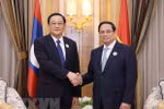 Thủ tướng Phạm Minh Chính gặp Thủ tướng Lào Sonexay Siphandone