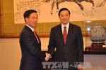 Đồng chí Võ Văn Thưởng gặp Trưởng ban Tuyên truyền Trung ương ĐCS Trung Quốc