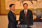 Đồng chí Võ Văn Thưởng gặp Trưởng ban Tuyên truyền Trung ương ĐCS Trung Quốc