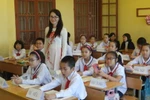 Giáo viên nữ mặc trang phục nào lên lớp là phù hợp nhất?