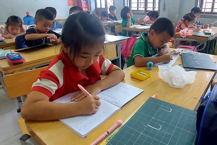 Học sinh Trường Tiểu học và Trung học cơ sở Sốp Cộp, xã Sốp Cộp, tỉnh Sơn La trong một tiết học. Ảnh: website nhà trường 2024-08-07-09-25-511.jpg