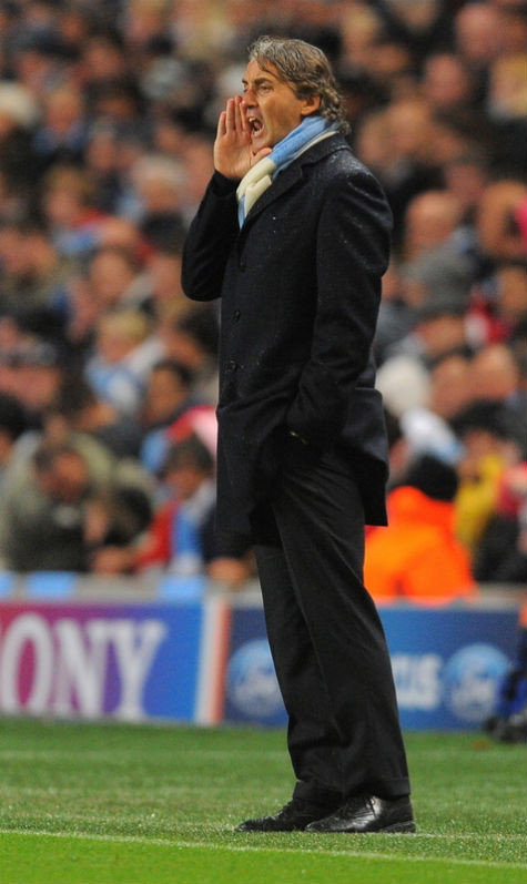 Roberto Mancini giờ không còn có thể giương oai với Tevez được nữa Roberto Mancini giờ không còn có thể giương oai với Tevez được nữa