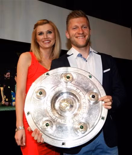 Tiền vệ Blaszczykowski cùng vợ