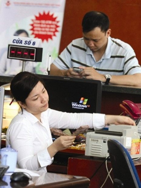 Thưởng Tết của nhân viên ngân hàng sẽ giảm mạnh vì lợi nhuận giảm.