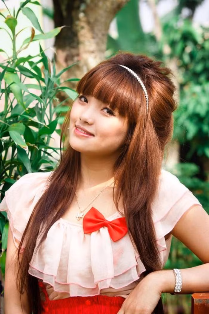 Ngoài chụp ảnh, Dung còn là một cây văn nghệ của trường