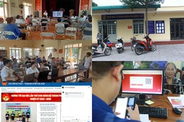 Anh Đinh Thành Trung đang hỗ trợ người dân đăng nhập hệ thống cổng Dịch vụ công quốc gia. Ảnh Mạnh Đoàn