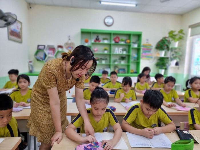 Học sinh Trường Tiểu học Nguyễn Văn Tố hào hứng khi học tiếng Hàn là Ngoại ngữ 1 (Ảnh: Lã Tiến) Học sinh Trường Tiểu học Nguyễn Văn Tố hào hứng khi học tiếng Hàn là Ngoại ngữ 1 (Ảnh: Lã Tiến)