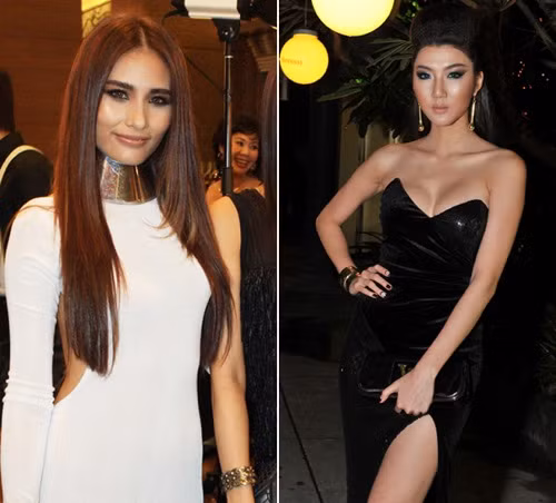 Lần này Ngọc Quyên có thêm bạn đồng hành là người mẫu Kim Minh. Cả hai mắc phải lỗi trang điểm khiến khuôn mặt trở nên cứng "như tượng sáp". Đôi mắt đậm và sắc, mặt tạo khối quá nét và môi bợt khiến hai người đẹp trông thật mất tự nhiên, thiếu sức sống. Xem thêm: Điểm danh những chiếc "cằm mới" của Sao Việt.