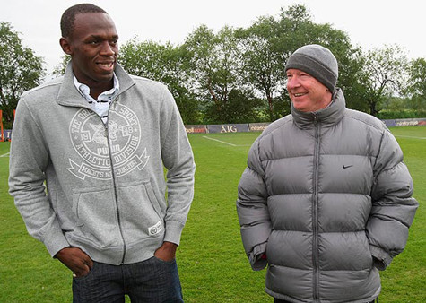 Bolt trong một lần thăm M.U - Ảnh Sun