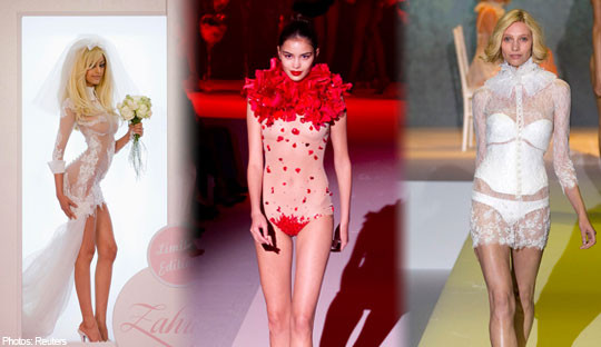 Zahia (trái) bên cạnh các người mẫu khác trong một bộ sưu tập tại Tuần lễ thời trang Thu Đông Paris 2012. Ảnh. Reuters. Zahia (trái) bên cạnh các người mẫu khác trong một bộ sưu tập tại Tuần lễ thời trang Thu Đông Paris 2012. Ảnh. Reuters.