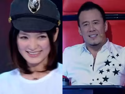 Đinh Đinh và HLV Dương Khôn tại The Voice Trung Quốc 2012.