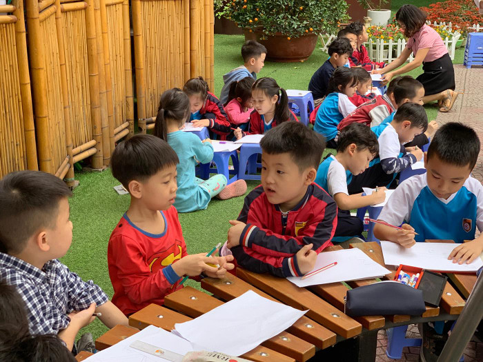 Cô Tâm tìm thấy hạnh phúc của nghề giáo ở ngay trong chính lớp học của mình. Ảnh minh họa: Tùng Dương. Cô Tâm tìm thấy hạnh phúc của nghề giáo ở ngay trong chính lớp học của mình. Ảnh minh họa: Tùng Dương.