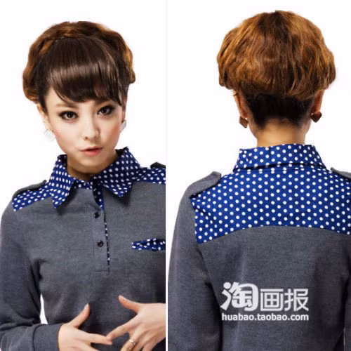 Túm gọn, rồi buộc bổng làn tóc rối cũng là một cách làm hay.(Ảnh: huabao) Xem thêm: Những mái tóc vàng óng được khát khao nhất thế giới