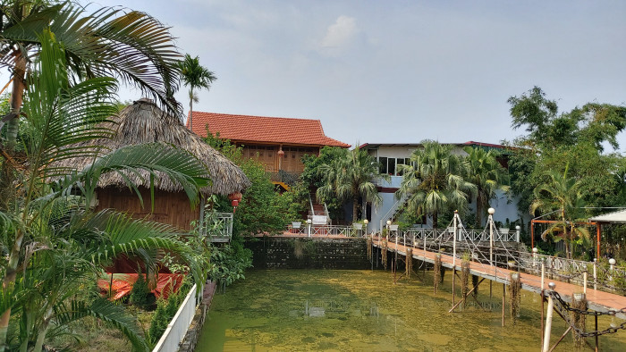 Công trình nhà ở của ông Nguyễn Quốc Bảo xây dựng ngay sát chân đê sông Cấm (Ảnh: Lã Tiến) Công trình nhà ở của ông Nguyễn Quốc Bảo xây dựng ngay sát chân đê sông Cấm (Ảnh: Lã Tiến)